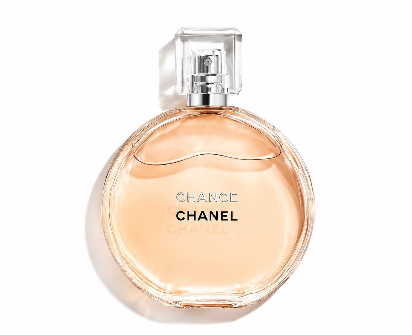 CHANEL Chance Eau de Parfum in the iconic round glass bottle with a crystal-clear square cap, displayed on a clean white background. This elegant floral fragrance opens with sparkling pink pepper, unfolds into a luminous jasmine heart, and finishes with warm amber and patchouli, creating a radiant, sophisticated, and timeless scent for everyday wear and special occasions.