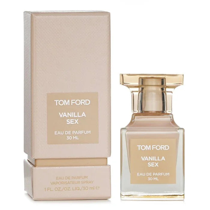 A 30ml Tom Ford Vanilla Sex Eau De Parfum bottle with semi-translucent cream-colored glass and a gold label, standing next to its matching textured cream gift box with a beige-and-white logo label.