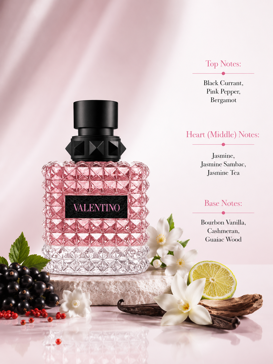 Valentino Donna Born in Roma Eau de Parfum displayed with fragrance notes, surrounded by blackcurrants, jasmine flowers, vanilla pods, lime, and wood, highlighting its floral woody fragrance with sparkling black currant, radiant jasmine trio, and warm bourbon vanilla with cashmeran and guaiac wood.