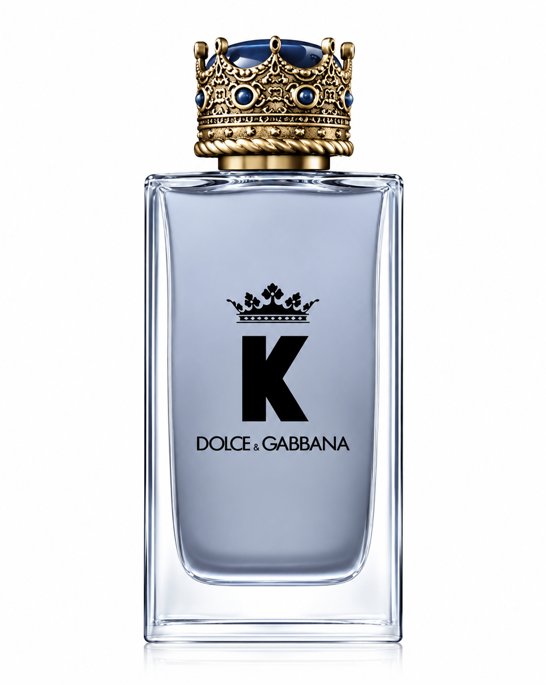 Dolce & Gabbana K Eau de Toilette bottle isolated on a clean white background, featuring a frosted blue glass bottle topped with an ornate gold crown cap adorned with deep blue gemstone details. The regal design reflects the masculine elegance and Mediterranean inspiration of this iconic men's fragrance.